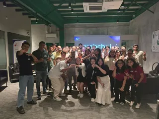 Year-end gathering at Monk's Brew Club: honest conversations about wins and lessons, supported by Singapore Global Network.